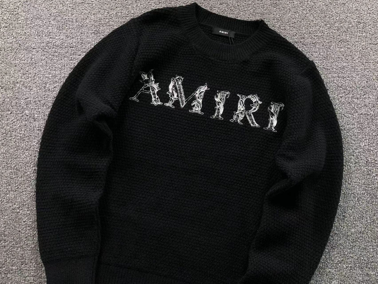 MAGLIONE AMIRI