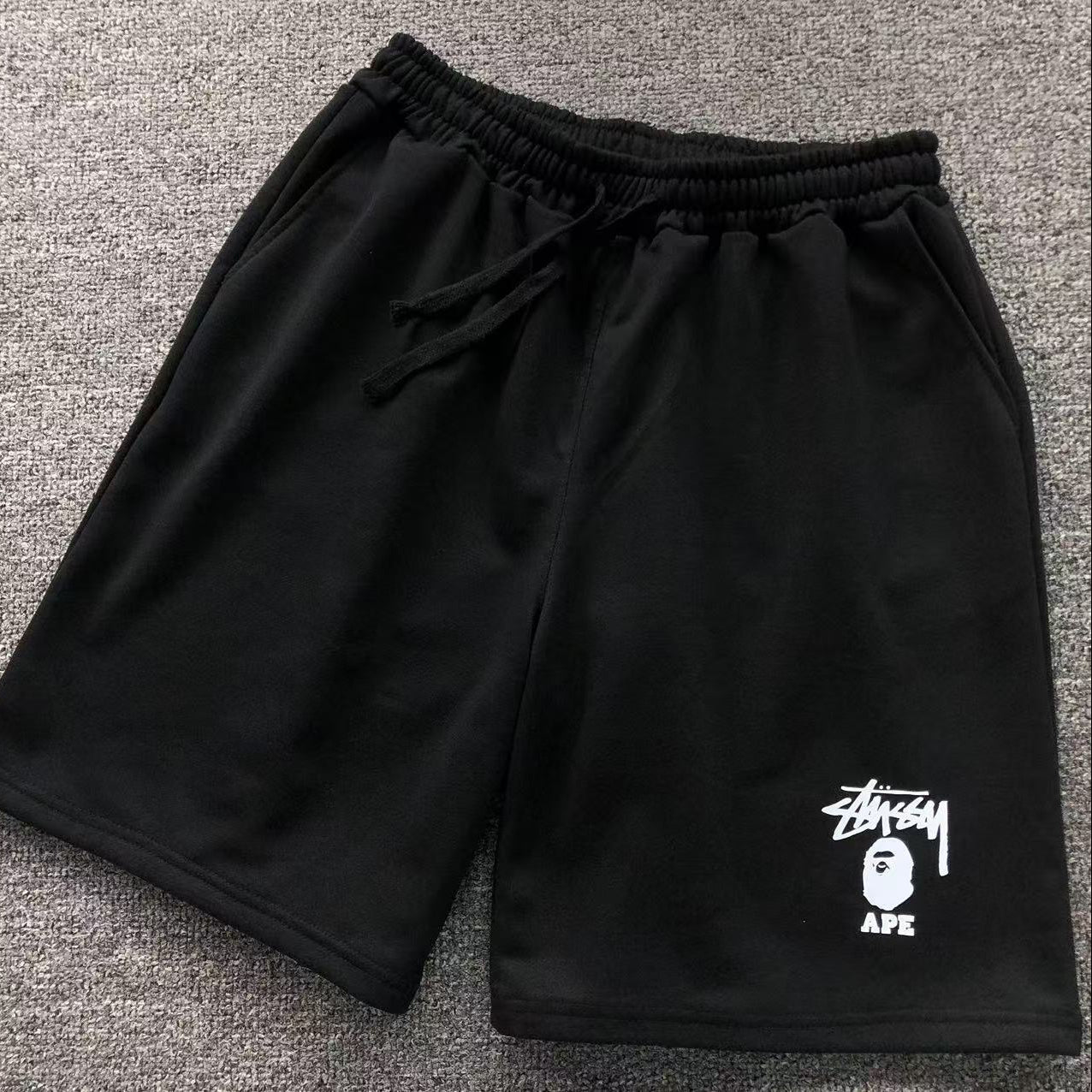 PANTALONCINI BAPE x STUSSY